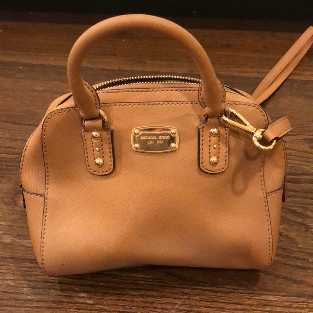 Micheal Kors tan cross body bag.